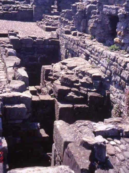 The remains of a section of toilets on the wall walk of Beaumaris Castle